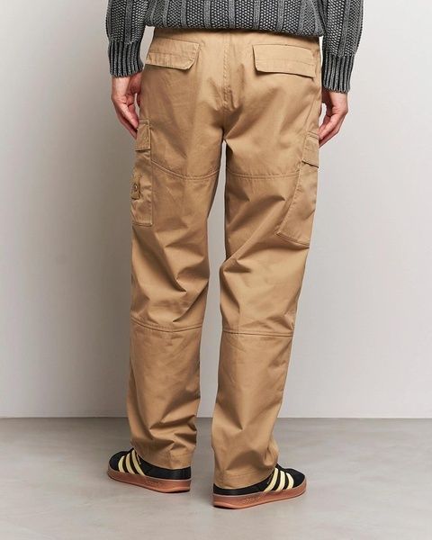 Штани Stone Island Ghost в бежевому кольорі розмір L 7915307F1 V0098 L фото